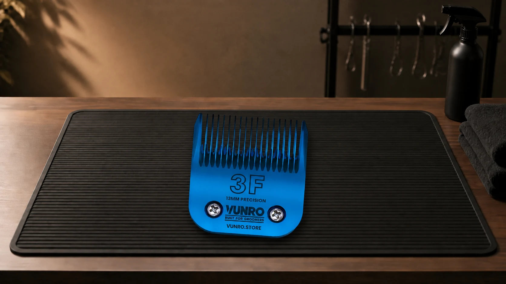 #3F Blue Steel Dog Clipper Blade (13 mm) resting naturally on the VUNRO grooming workbench